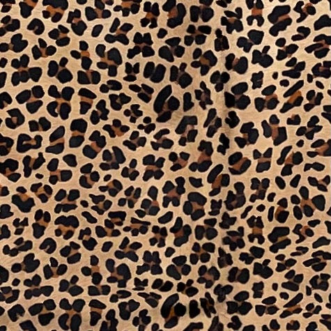 Closeup of this Light Brown Brazilian Cowhide, showing a stenciled brown and black, leopard print - 7'5" x 6'3" (BRLP122)