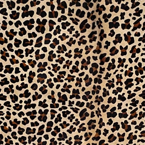 Closeup of this Light Beige Brazilian Cowhide, showing a stenciled brown and black, leopard print (BRLP127)