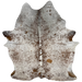 Large Brown and White Speckled Brazilian Cowhide, 1 brand mark:  white with brown speckles and spots, and has one caramel spots on the right side of the back, has one brand mark on the left hind shank - 7'6" x 6' (BRSP1907)