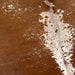 Closeup of this Large, Reddish Brown and White, Speckled, Brazilian Cowhide, showing mostly solid reddish brown, with white speckles in the middle and on the shoulder, and white with brown speckles down the middle (BRSP1983)