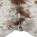 Large White and Brown Speckled Brazilian Cowhide, showing one brand mark near the lower edge, on the left side (BRSP1988)
