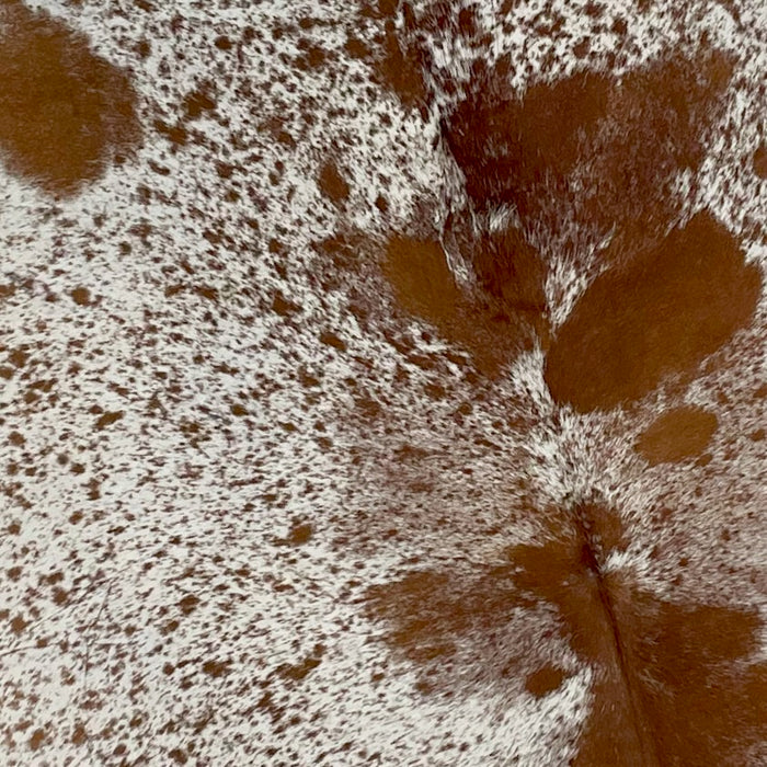 Closeup of this Large, Off-White and Brown, Speckled, Brazilian Cowhide, showing off-white with brown speckles and spots (BRSP2008)