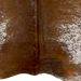 Closeup of this XL Brown and White Speckled Brazilian Cowhide, showing one brand mark on the right side, near the lower edge (BRSP2059)