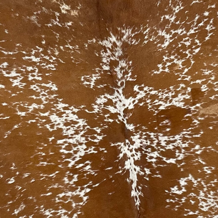 Closeup of this Speckled Brazilian Cowhide, showing  brown with white speckles and spots (BRSP2289)