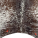 Closeup of this Large Tricolor Speckled Brazilian Cowhide, showing one brand mark on each side of the butt (BRSP2432)