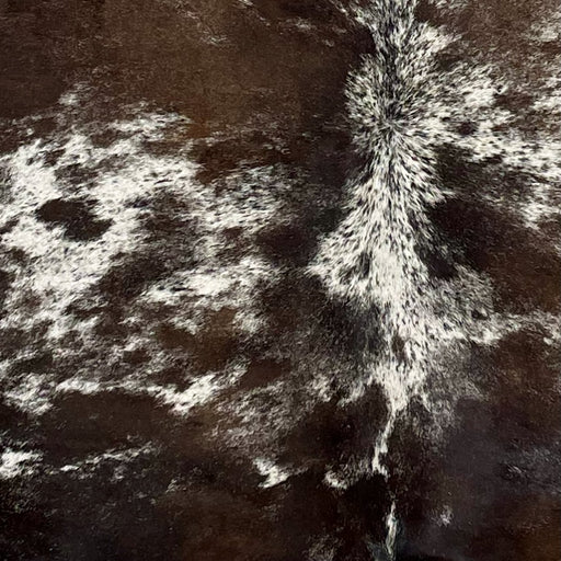 Closeup of this Large Speckled Brazilian Cowhide, showing white with dark brown speckles and small and large spots (BRSP2491)