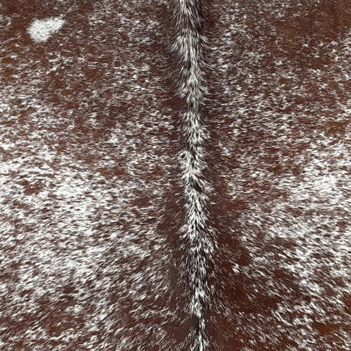 Closeup of this Speckled Brazilian Cowhide, showing white with brown speckles and spots (BRSP2760)