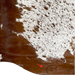 Closeup of this White and Reddish Brown Speckled Brazilian Cowhide, showing one brand mark on the right side of the butt  (BRSP2766)