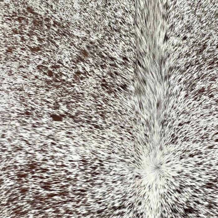 Closeup of this Large Speckled Brazilian Cowhide, showing white with brown speckles and spots (BRSP2805)