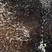 Closeup of this Tricolor Speckled Brazilian Cowhide, showing dark brown and dark golden brown with white speckles and spots  (BRSP2848)