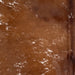 Closeup of this Speckled Brazilian Cowhide, showing reddish brown with white speckles and spots (BRSP3012)