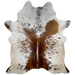White and Dk Reddish Brown Speckled Brazilian Cowhide: white with dark reddish brown speckles and spots, and it has almond on the belly, butt, and hind shanks - 6'2" x 4'6" (BRSP3198)