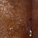 Closeup of this Speckled Brazilian Cowhide, showing dark reddish brown with white speckles and spots  (BRSP3213)