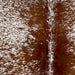 Closeup of this Speckled Brazilian Cowhide, showing white with reddish brown speckles and spots (BRSP3217)