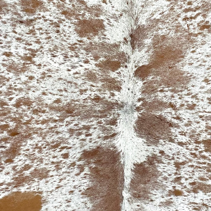 Closeup of this Speckled Brazilian Cowhide, showing white with brown speckles and spots (BRSP3242)