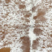 Closeup of this Speckled Brazilian Cowhide, showing white with brown speckles and spots (BRSP3242)