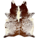XL Dk Reddish Brown and White Speckled Brazilian Cowhide: has long hair that is white with dark, reddish brown speckles and spots, and off-white on the belly and down the middle of the shoulder- 8'5" x 6'4" (BRSP3246)