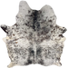 Black and White Speckled Brazilian Cowhide: white with black speckles and spots, a few small brown spots on the left side, and one brand mark on the left side of the butt - 6'5" x 5'1" (BRSP3336)