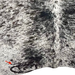 Closeup of this Black and white Speckled Brazilian Cowhide, showing one brand mark on the left side of the butt  (BRSP3336)