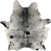 Black and White Speckled Brazilian Cowhide: white with black speckles and spots, and one large and one small, dark brown spots on the left side of the back - 6'11" x 5'4" (BRSP3342)