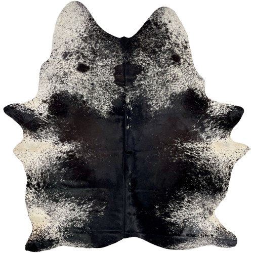 Black and White Speckled Brazilian Cowhide: mostly solid black down the middle, and white with black speckles and spots on the belly, shanks, and shoulder - 6'9" x 5'5" (BRSP3343)