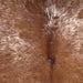 Closeup of this Speckled Brazilian Cowhide, showing reddish brown with white speckles and spots (BRSP3355)