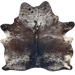 Dk Brown and White Speckled Brazilian Cowhide: dark brown with white speckles and spots, and two brand marks on the right side of the butt - 6'11" x 6'3" (BRSP3366)
