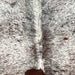 Closeup of this Large Tricolor Speckled Brazilian Cowhide, showing white with brown and black speckles and spots  (BRSP3385)
