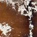 Closeup of this Large Speckled Brazilian Cowhide, showing white with brown speckles, and large and small, brown spots (BRSP3390)