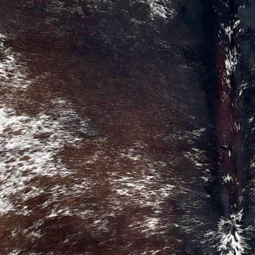 closeup of this Large Speckled Brazilian Cowhide, showing white with dark brown speckles and spots (BRSP3391)