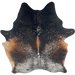 Large Speckled Tricolor Brazilian Cowhide: black, brown, and dark brown, with white speckles and spots, and two brand marks on the right side of the back, and three on the right side of the butt - 7'6" x 5'9" (BRSP3397)