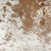 Closeup of this Speckled Brazilian Cowhide, showing white with brown speckles and spots (BRSP3398)