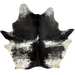 XXL Black and White Speckled Brazilian Cowhide: mostly black, with a few white speckles, across the shoulder and down the middle, white with black speckles and spots on the back, and off-white with black speckles on the belly and hind shanks - 8'8" x 7'6" (BRSP3419)