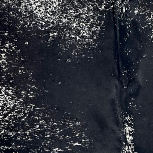Closeup of this Large Speckled Brazilian Cowhide, showing black with white speckles and spots (BRSP3422)