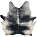 Large Black and White Speckled Brazilian Cowhide: black with white speckles and spots, and off-white on the belly - 7'5" x 6'5" (BRSP3439)