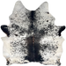 Black and White Speckled Brazilian Cowhide: white with black speckles and spots, and brown down part of the spine - 7' x 6'3" (BRSP3446)