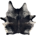 Large Black and White Speckled Brazilian Cowhide: mostly solid black down the middle, brown down part of the spine, and white with black speckles on the belly, shoulder, and shanks - 7'5"  x 6'4" (BRSP3447)