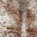 Closeup of this Speckled Brazilian Cowhide, showing white with brown speckles and spots (BRSP3459)