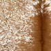 Closeup of this Speckled Brazilian Cowhide, showing white with brown speckles and spots, and reddish brown down the middle (BRSP3460)