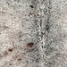 Closeup of this Tricolor Speckled Brazilian Cowhide, showing white with brown and black speckles and spots (BRSP3463)