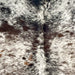 Closeup of this Tricolor Speckled Brazilian Cowhide, showing white with black and dark brown speckles and spots (BRSP3471)