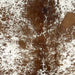 Closeup of this Speckled Brazilian Cowhide, showing white with chocolate speckles and spots (BRSP3475)