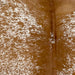Closeup of this Speckled Brazilian Cowhide, showing white with caramel speckles and spots (BRSP3478)