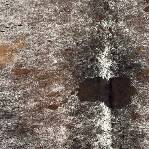 Closeup of this Tricolor Speckled Brazilian Cowhide, showing white with brown and black speckles and spots (BRSP3487)