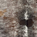 Closeup of this Tricolor Speckled Brazilian Cowhide, showing white with brown and black speckles and spots (BRSP3487)