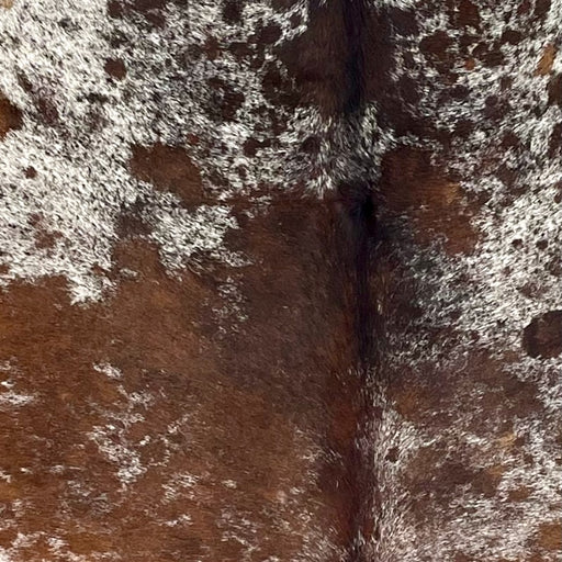 Closeup of thisSpeckled Brazilian Cowhide, showing white with brown speckles and spots (BRSP3490)