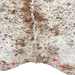 Closeup of this White and Brown Speckled Brazilian Cowhide, showing three brand marks on the butt (BRSP3500)