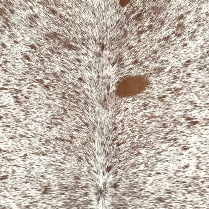 Closeup of this Speckled Brazilian Cowhide, showing white with brown speckles and spots (BRSP3501)