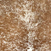 Closeup of this Speckled Brazilian Cowhide, showing off-white with brown speckles and spots (BRSP3506)