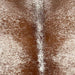 Closeup of this Speckled Brazilian Cowhide, showing white with brown speckles and spots (BRSP3511)